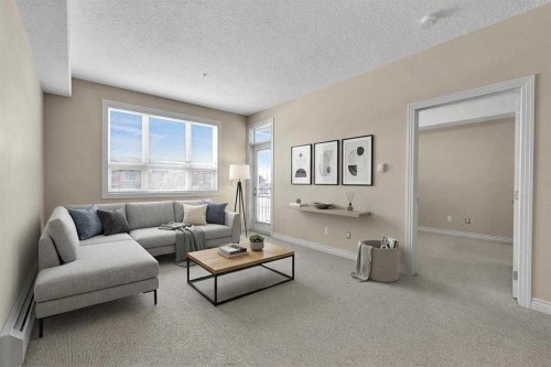 318-26 Val Gardena View Sw, Calgary, AB - Indoor Photo Showing Living Room