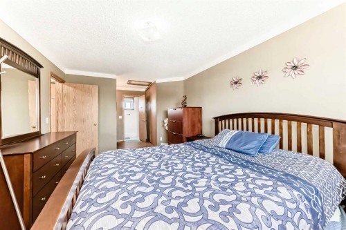 69 Applemont Place Se, Calgary, AB - Indoor Photo Showing Bedroom