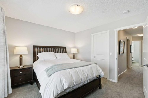 1119 Livingston Way Ne, Calgary, AB - Indoor Photo Showing Bedroom