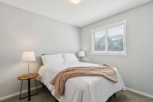 1119 Livingston Way Ne, Calgary, AB - Indoor Photo Showing Bedroom
