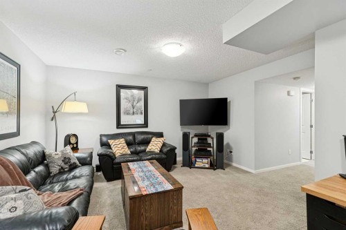 1119 Livingston Way Ne, Calgary, AB - Indoor Photo Showing Living Room