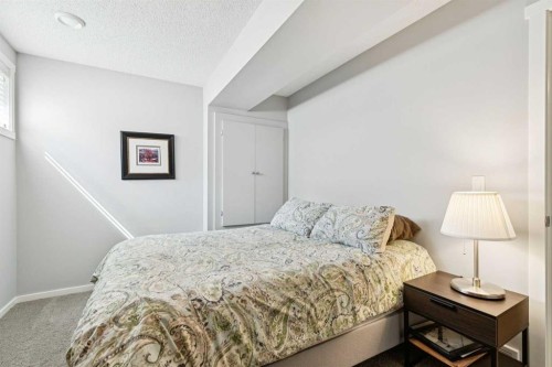 1119 Livingston Way Ne, Calgary, AB - Indoor Photo Showing Bedroom