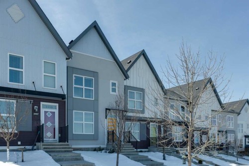 1119 Livingston Way Ne, Calgary, AB - Outdoor With Facade