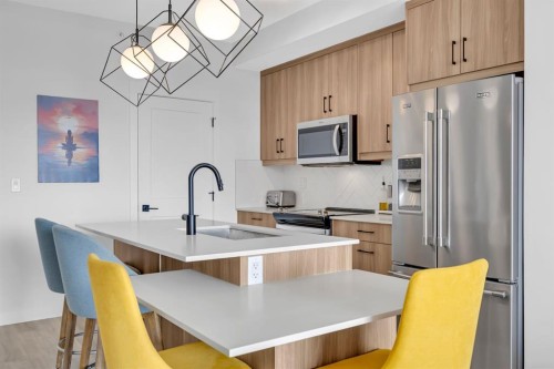 3404-200 Seton Circle Se, Calgary, AB - Indoor Photo Showing Kitchen With Stainless Steel Kitchen With Upgraded Kitchen