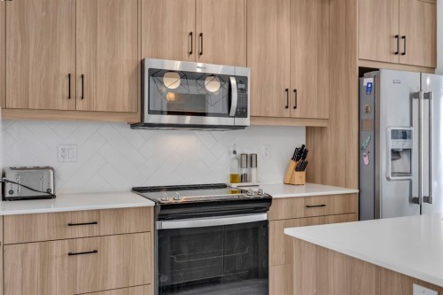 3404-200 Seton Circle Se, Calgary, AB - Indoor Photo Showing Kitchen