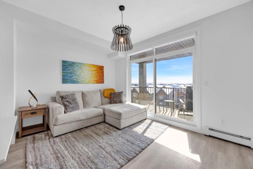 3404-200 Seton Circle Se, Calgary, AB - Indoor Photo Showing Living Room