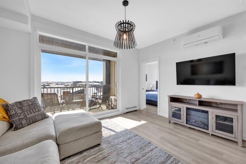 3404-200 Seton Circle Se, Calgary, AB - Indoor Photo Showing Living Room