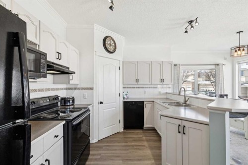 40 Edgeridge Terrace Nw, Calgary, AB - Indoor Photo Showing Kitchen With Double Sink