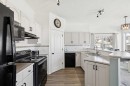 40 Edgeridge Terrace Nw, Calgary, AB  - Indoor Photo Showing Kitchen With Double Sink 