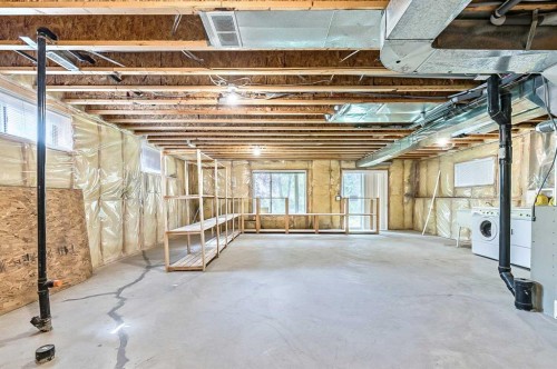 265 Somerside Park Sw, Calgary, AB - Indoor Photo Showing Basement