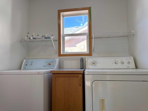 244 Los Alamos Place Ne, Calgary, AB - Indoor Photo Showing Laundry Room