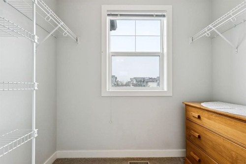 1502 Jumping Pound Common, Cochrane, AB - Indoor With Storage