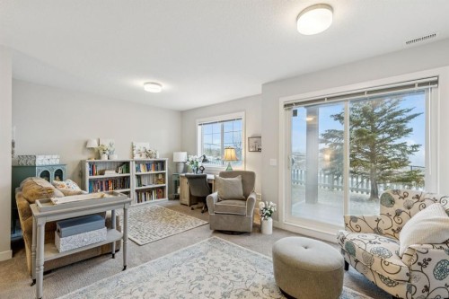 1502 Jumping Pound Common, Cochrane, AB - Indoor Photo Showing Living Room