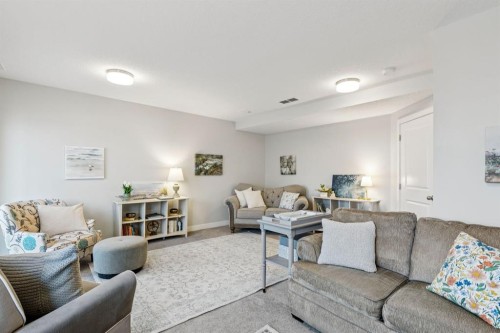 1502 Jumping Pound Common, Cochrane, AB - Indoor Photo Showing Living Room