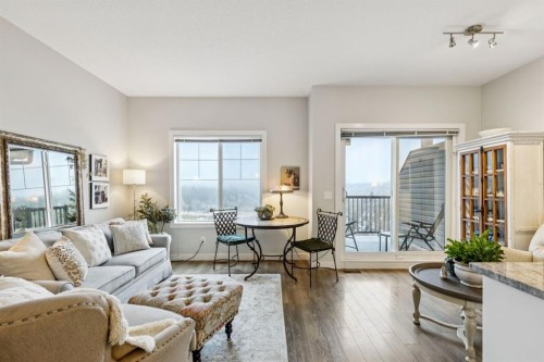 1502 Jumping Pound Common, Cochrane, AB - Indoor Photo Showing Living Room