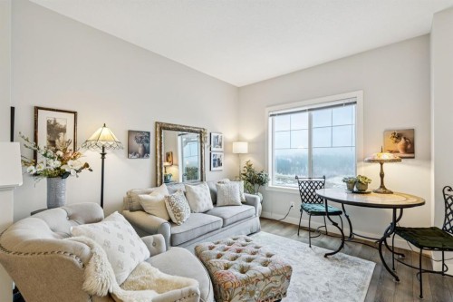 1502 Jumping Pound Common, Cochrane, AB - Indoor Photo Showing Living Room