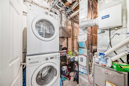 392 Redstone Drive Ne, Calgary, AB - Indoor Photo Showing Laundry Room