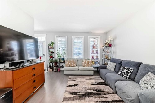 392 Redstone Drive Ne, Calgary, AB - Indoor Photo Showing Living Room