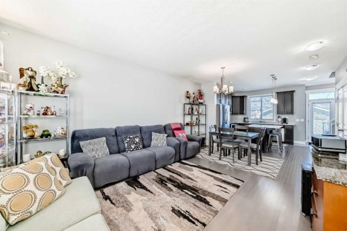 392 Redstone Drive Ne, Calgary, AB - Indoor Photo Showing Living Room