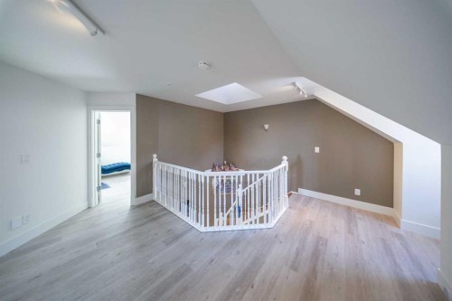 39 Slopes Grove Sw, Calgary, AB - Indoor Photo Showing Other Room