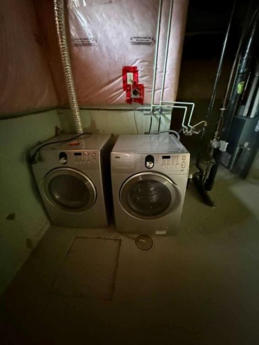 235 Fallswater Road Ne, Calgary, AB - Indoor Photo Showing Laundry Room
