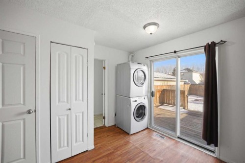 19 Appletree Close Se, Calgary, AB - Indoor Photo Showing Laundry Room