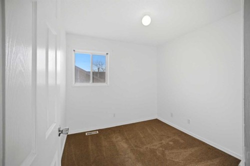 19 Appletree Close Se, Calgary, AB - Indoor Photo Showing Other Room