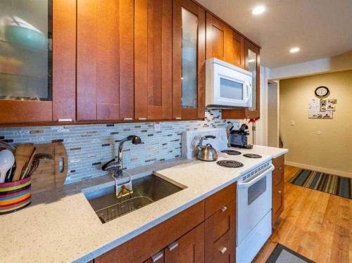 101 Westpoint Gardens, Calgary, AB - Indoor Photo Showing Kitchen With Double Sink