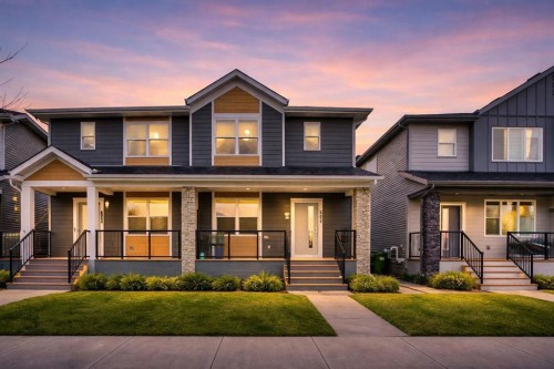 667 Wolf Willow Boulevard Se, Calgary, AB - Outdoor With Deck Patio Veranda With Facade