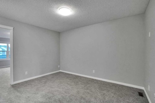 667 Wolf Willow Boulevard Se, Calgary, AB - Indoor Photo Showing Other Room