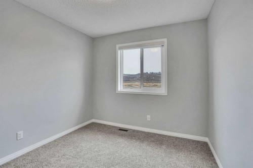 667 Wolf Willow Boulevard Se, Calgary, AB - Indoor Photo Showing Other Room