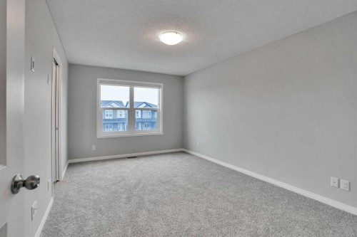 667 Wolf Willow Boulevard Se, Calgary, AB - Indoor Photo Showing Other Room