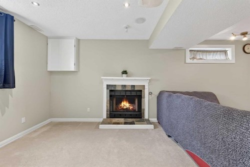 111 Sanderling Rise Nw, Calgary, AB - Indoor With Fireplace