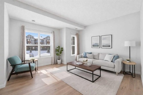 413-250 Fireside View, Cochrane, AB - Indoor Photo Showing Living Room