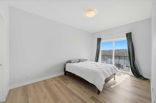 413-250 Fireside View, Cochrane, AB - Indoor Photo Showing Bedroom