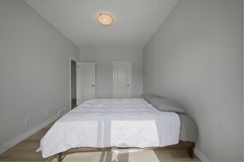 413-250 Fireside View, Cochrane, AB - Indoor Photo Showing Bedroom