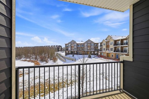 413-250 Fireside View, Cochrane, AB - Outdoor With Balcony With Exterior