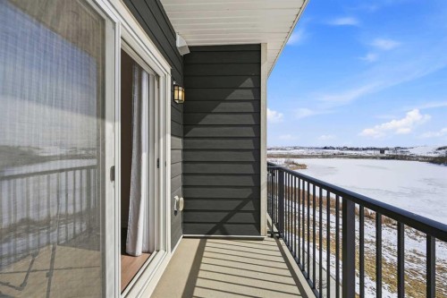413-250 Fireside View, Cochrane, AB - Outdoor With Balcony With Exterior