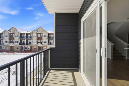 413-250 Fireside View, Cochrane, AB - Outdoor With Balcony With Exterior