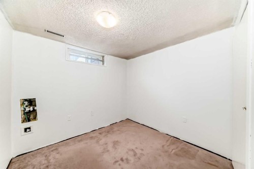130 Pinemeadow Road Ne, Calgary, AB - Indoor Photo Showing Other Room