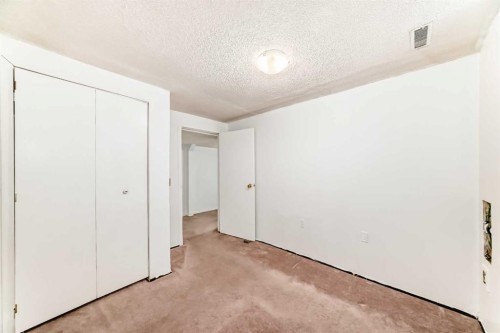 130 Pinemeadow Road Ne, Calgary, AB - Indoor Photo Showing Other Room