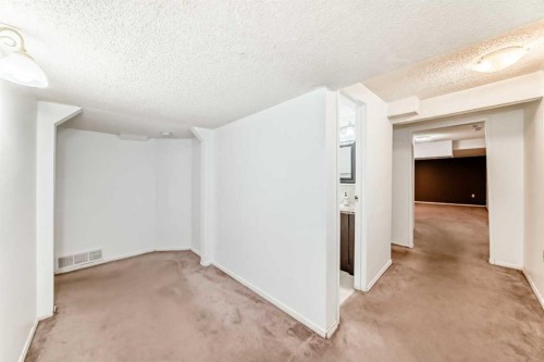 130 Pinemeadow Road Ne, Calgary, AB - Indoor Photo Showing Other Room