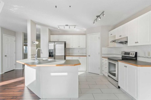 10 Arbour Stone Rise Nw, Calgary, AB - Indoor Photo Showing Kitchen