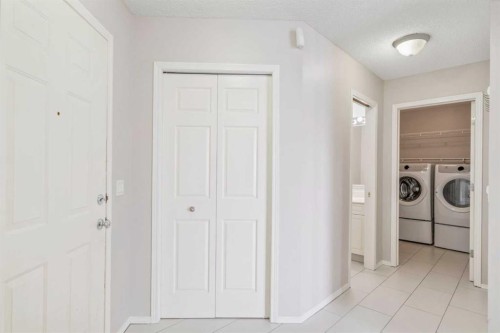 10 Arbour Stone Rise Nw, Calgary, AB - Indoor Photo Showing Laundry Room