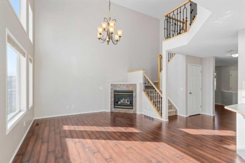10 Arbour Stone Rise Nw, Calgary, AB - Indoor With Fireplace