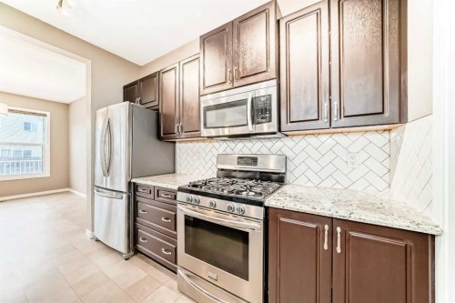 144 Auburn Glen Close Se, Calgary, AB - Indoor Photo Showing Kitchen With Upgraded Kitchen