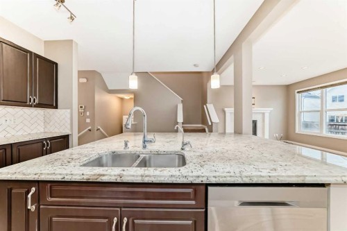 144 Auburn Glen Close Se, Calgary, AB - Indoor Photo Showing Kitchen With Double Sink With Upgraded Kitchen