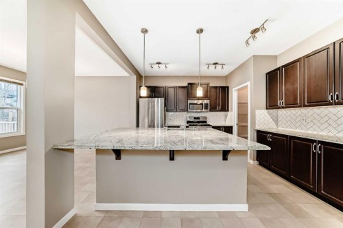 144 Auburn Glen Close Se, Calgary, AB - Indoor Photo Showing Kitchen With Upgraded Kitchen