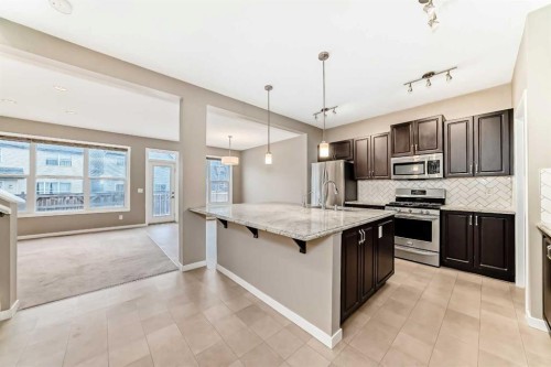 144 Auburn Glen Close Se, Calgary, AB - Indoor Photo Showing Kitchen With Upgraded Kitchen