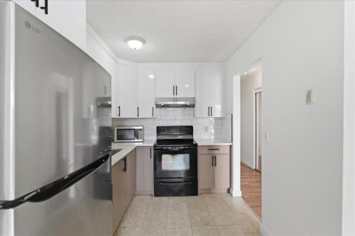 79 Fonda Drive Se, Calgary, AB - Indoor Photo Showing Kitchen